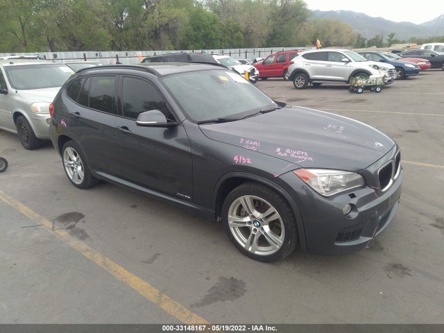 2014 BMW X1, VIN: WBAVM5C54EVV92671