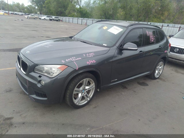2014 BMW X1, VIN: WBAVM5C54EVV92671