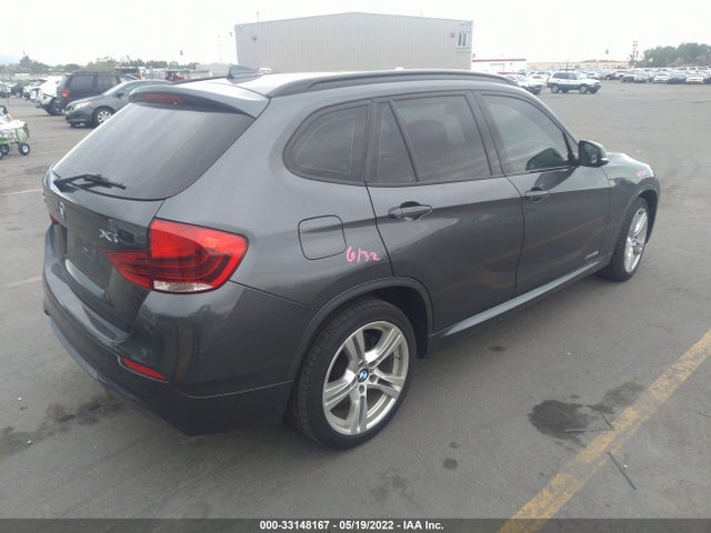 2014 BMW X1, VIN: WBAVM5C54EVV92671