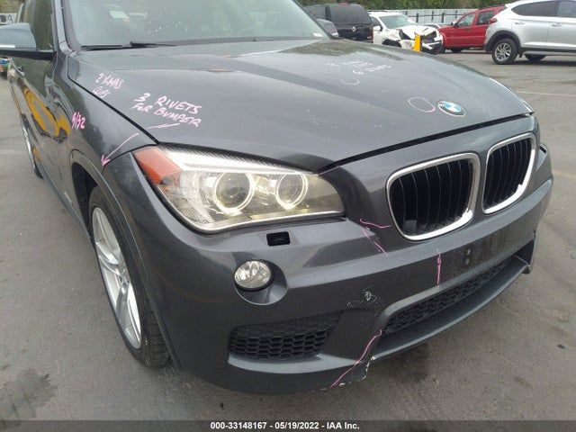 2014 BMW X1, VIN: WBAVM5C54EVV92671