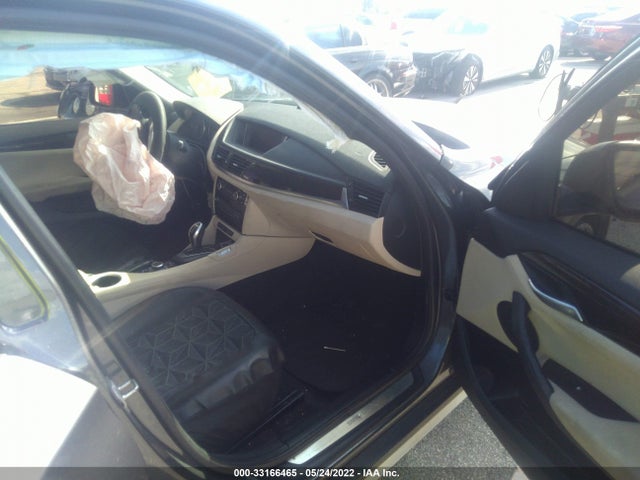 2015 BMW X1, VIN: WBAVM1C55FV316221