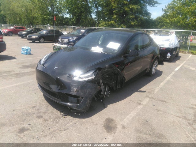 Tesla Model Y 2021 5YJYGDEE3MF063577 Image 2