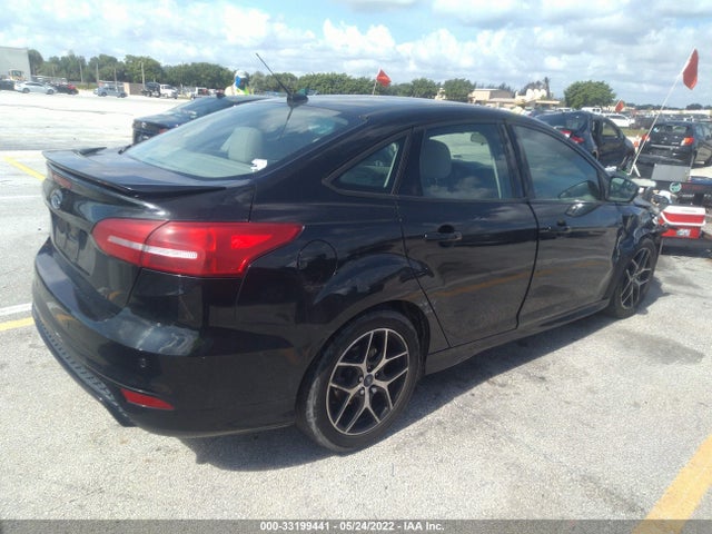 2015 Ford Focus, VIN: 1FADP3F28FL312636