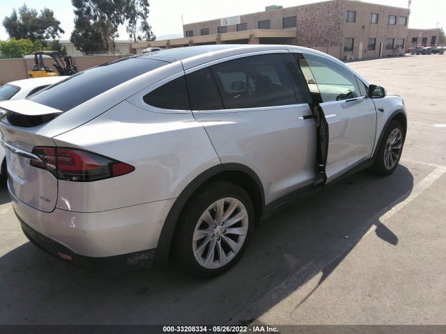 2018 Tesla Model X, VIN: 5YJXCAE20JF091179