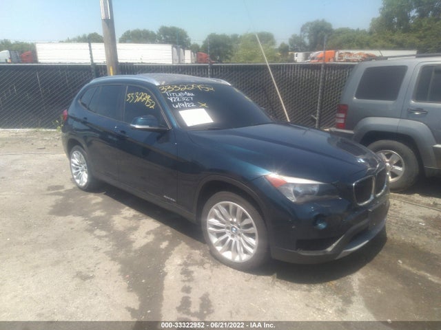2014 BMW X1, VIN: WBAVL1C57EVY22327