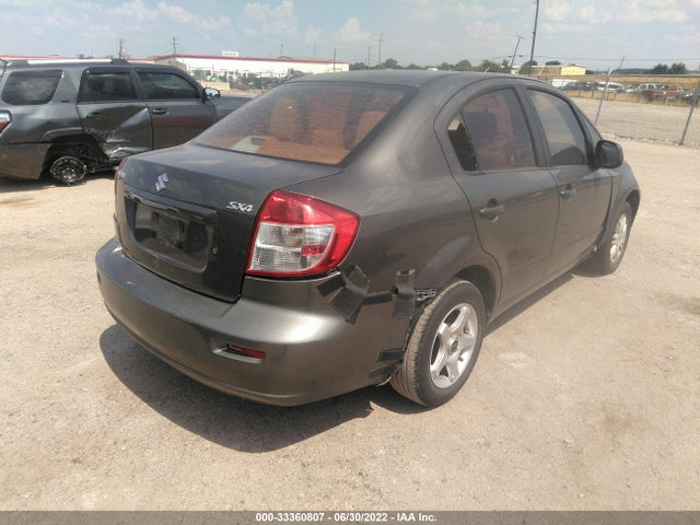 JS2YC5A39C6303849 Suzuki SX4 LE