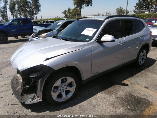 2014 BMW X1, VIN: WBAVM1C5XEVW55149