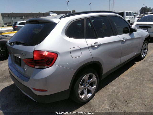 2014 BMW X1, VIN: WBAVM1C5XEVW55149