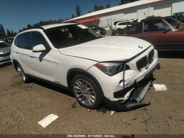 2014 BMW X1, VIN: WBAVM1C58EVW54453
