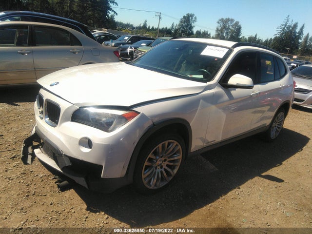 2014 BMW X1, VIN: WBAVM1C58EVW54453