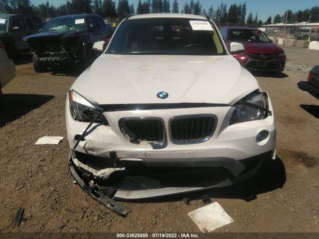 2014 BMW X1, VIN: WBAVM1C58EVW54453