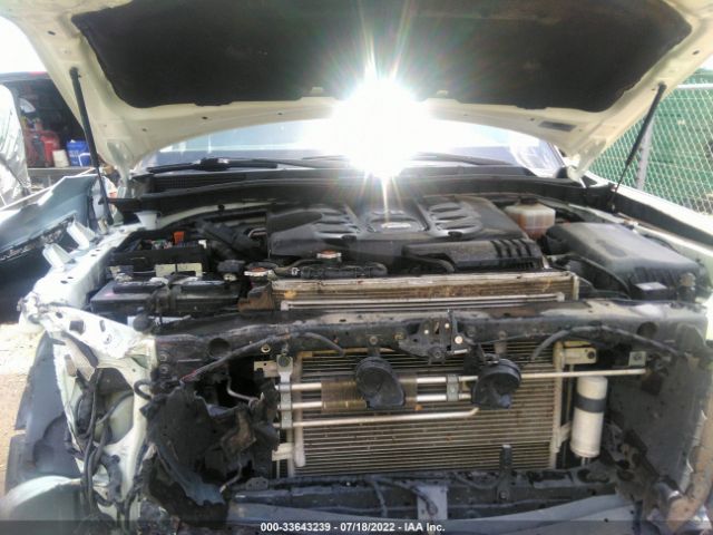 JN8AY2ND1JX002048 Nissan Armada Sl