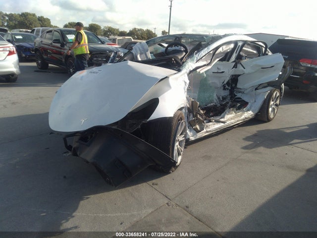 2021 TESLA MODEL Y 5YJYGDEE1MF087909 Photo 1