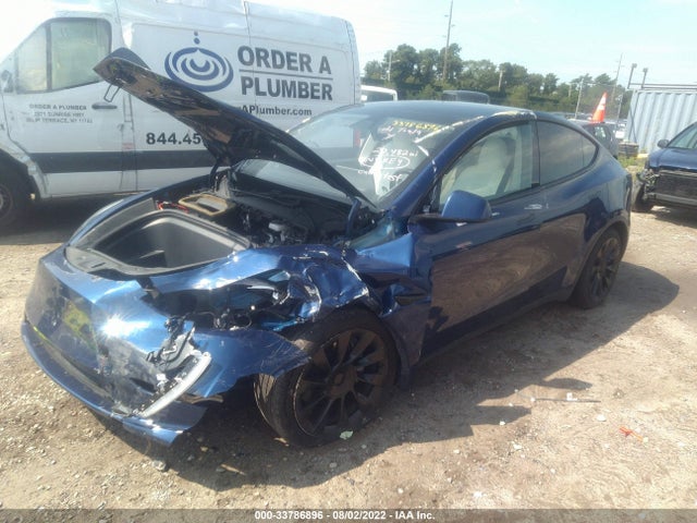Tesla Model Y 2021 5YJYGDEE8MF083355 Image 2