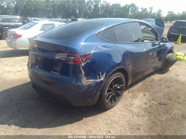 Tesla Model Y 2021 5YJYGDEE8MF083355 Image 4