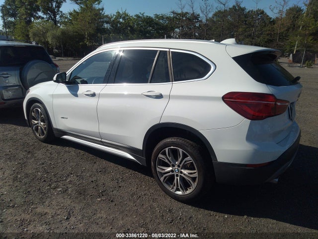 2017 BMW X1, VIN: WBXHT3Z33H4A57411