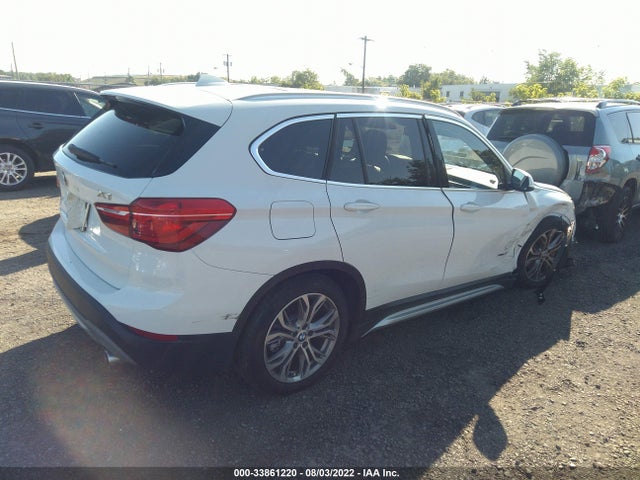 2017 BMW X1, VIN: WBXHT3Z33H4A57411