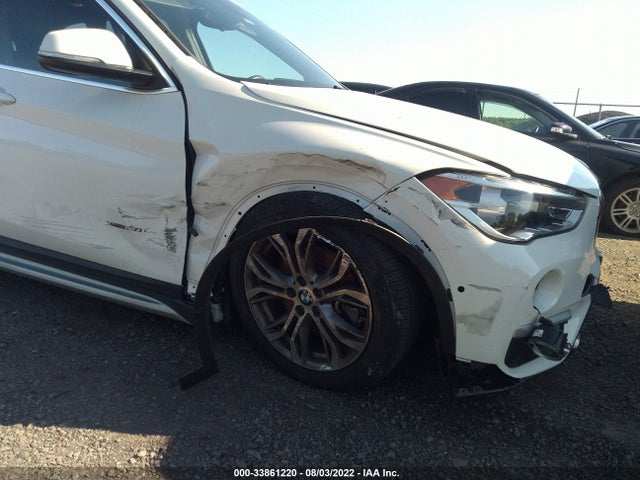 2017 BMW X1, VIN: WBXHT3Z33H4A57411