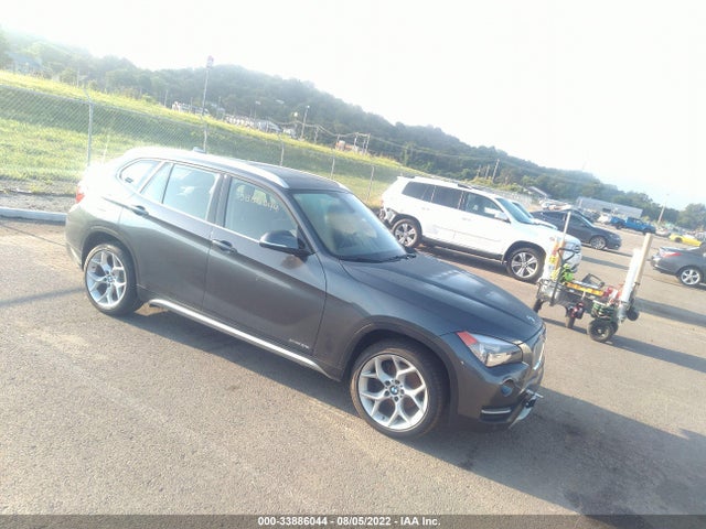 2014 BMW X1, VIN: WBAVL1C52EVY20470