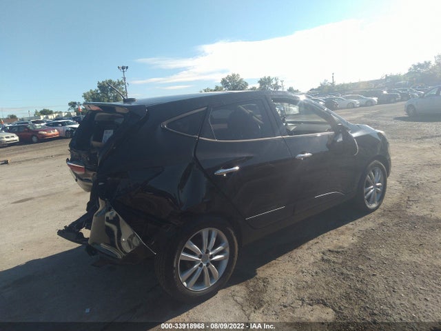 2013 HYUNDAI TUCSON LIMITED VIN: KM8JU3AC0DU548612