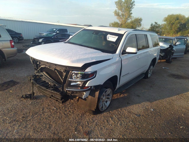 2015 Chevrolet Suburban, VIN: 1GNSCJKCXFR593164