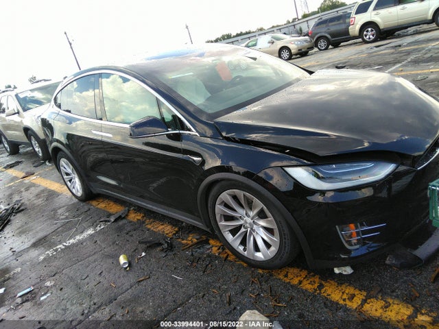 2021 Tesla Model X, VIN: 5YJXCBE21MF321774