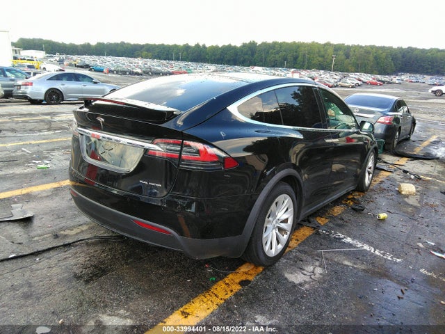 2021 Tesla Model X, VIN: 5YJXCBE21MF321774