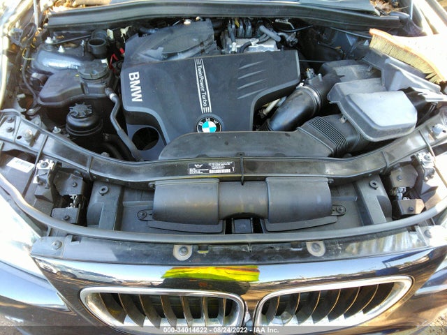 2014 BMW X1, VIN: WBAVL1C54EVY20258