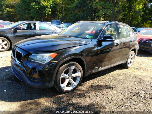 2014 BMW X1, VIN: WBAVL1C54EVY20258
