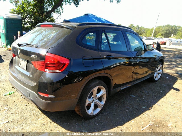 2014 BMW X1, VIN: WBAVL1C54EVY20258