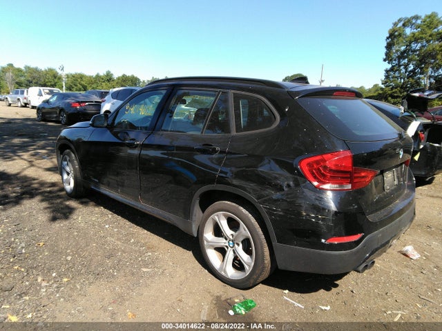 2014 BMW X1, VIN: WBAVL1C54EVY20258