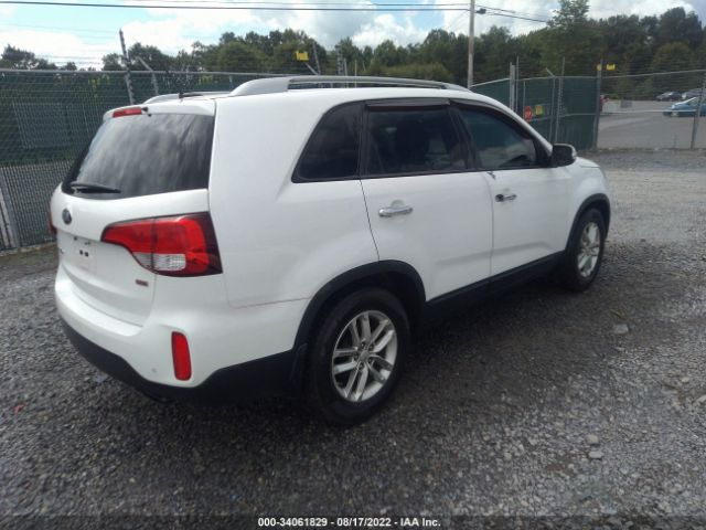 5XYKT3A69EG528819 KIA SORENTO LX