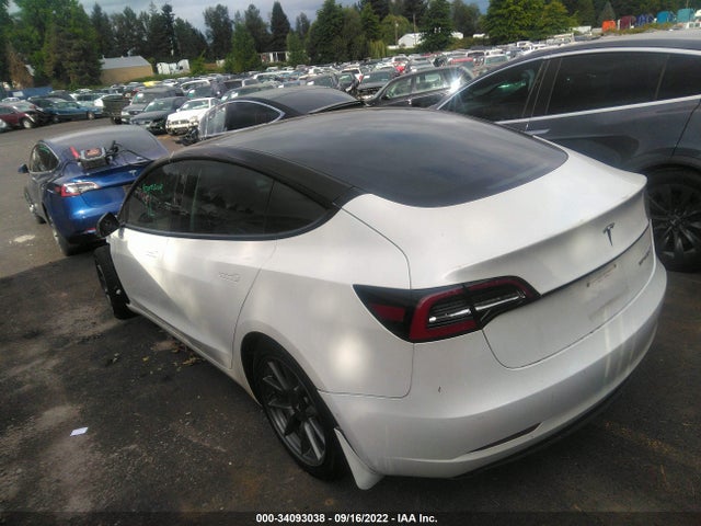 Tesla Model 3 Standard Range Plus 2021 5YJ3E1EAXMF867788 Image 4