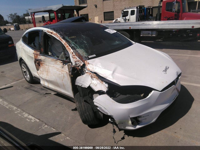 2018 Tesla Model X, VIN: 5YJXCDE28JF122826