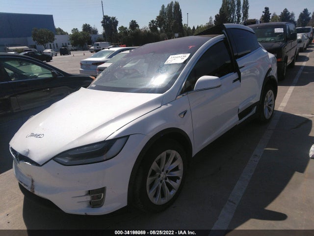 2018 Tesla Model X, VIN: 5YJXCDE28JF122826
