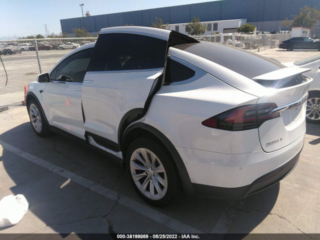 2018 Tesla Model X, VIN: 5YJXCDE28JF122826