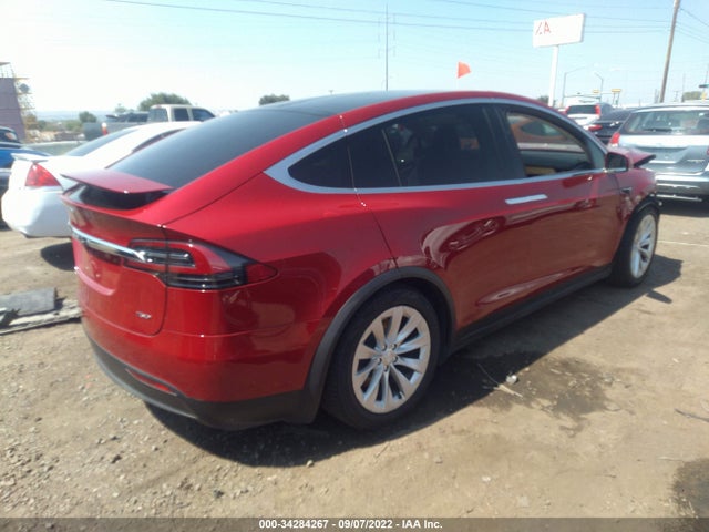 2018 Tesla Model X, VIN: 5YJXCBE25JF140110
