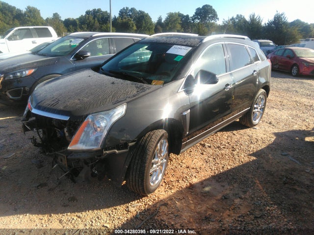 2014 Cadillac SRX, VIN: 3GYFNGE38ES600282