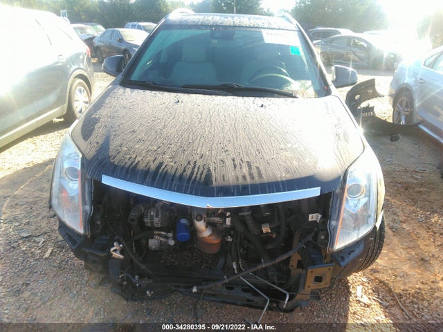 2014 Cadillac SRX, VIN: 3GYFNGE38ES600282