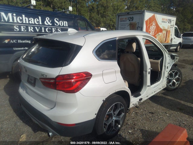 2017 BMW X1, VIN: WBXHT3C30H5F87581