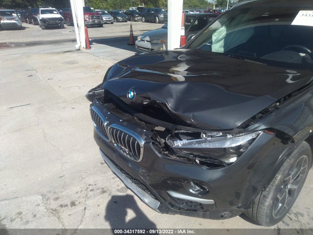 2019 BMW X1, VIN: WBXHU7C50K5L11086