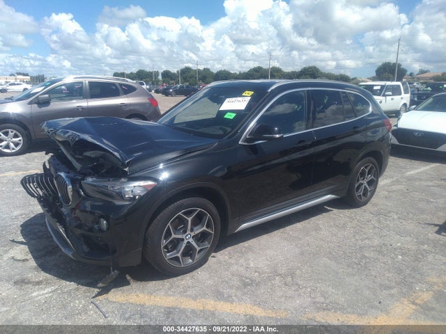 2019 BMW X1, VIN: WBXHU7C59K5L10986