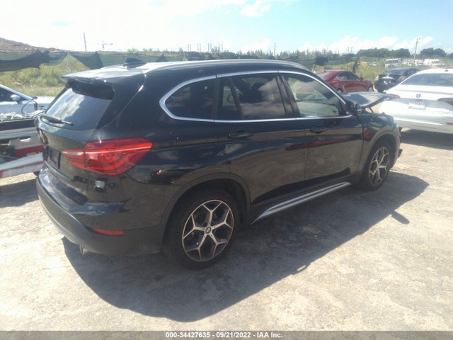 2019 BMW X1, VIN: WBXHU7C59K5L10986