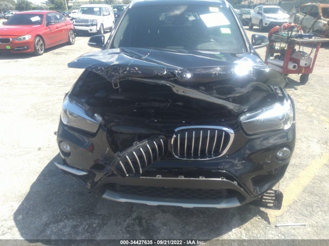 2019 BMW X1, VIN: WBXHU7C59K5L10986