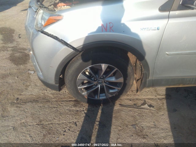 2018 Toyota RAV4, VIN: JTMRJREV1JD237121