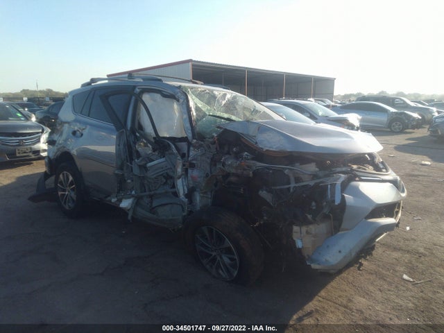 2018 Toyota RAV4, VIN: JTMRJREV1JD237121