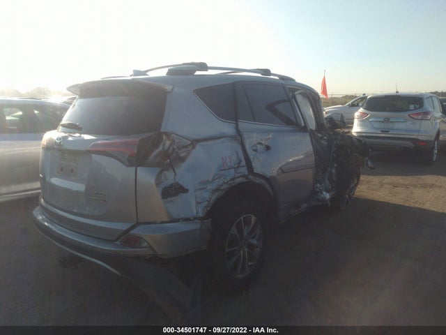 2018 Toyota RAV4, VIN: JTMRJREV1JD237121