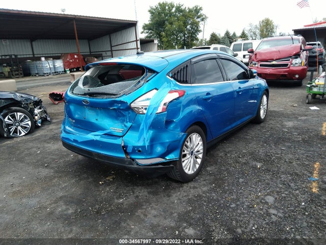 2016 Ford Focus, VIN: 1FADP3N29GL390538
