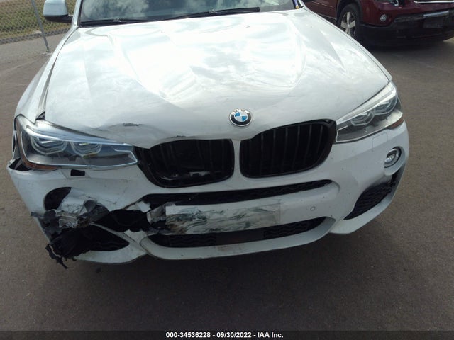 2016 BMW X4, VIN: 5UXXW5C59G0N91987