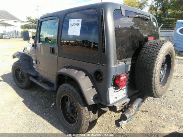 1J4FA49S82P720573 Jeep Wrangler Sport